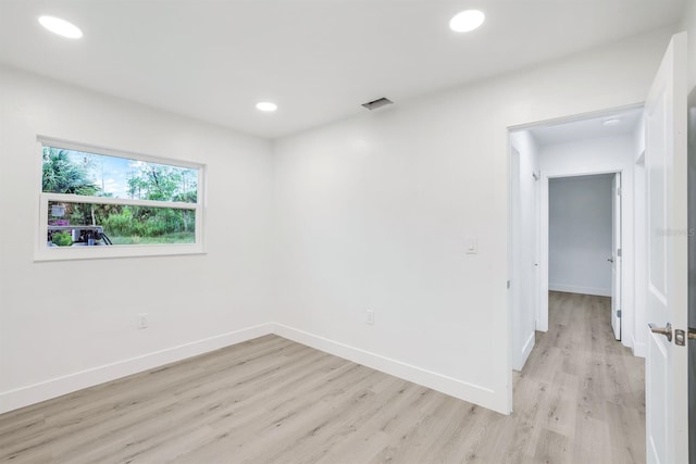 empty room featuring light hardwood / wood-style floors