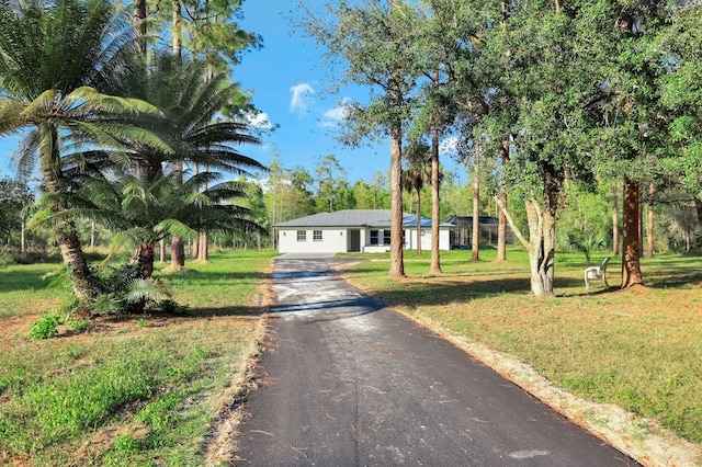 view of front of home with a front lawn