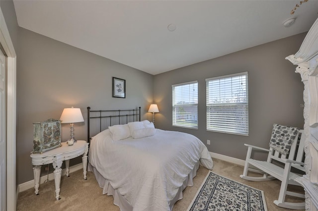 bedroom with light carpet