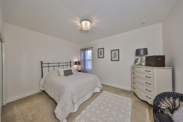 bedroom with light carpet