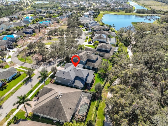 bird's eye view with a water view