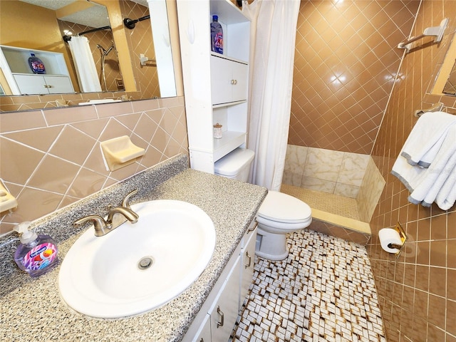 bathroom featuring tile walls, toilet, decorative backsplash, a stall shower, and vanity