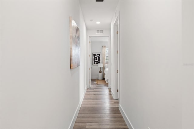6207 64th Way N, Pinellas Park, FL 33781 - hallway with baseboards, dark wood finished floors, and recessed lighting