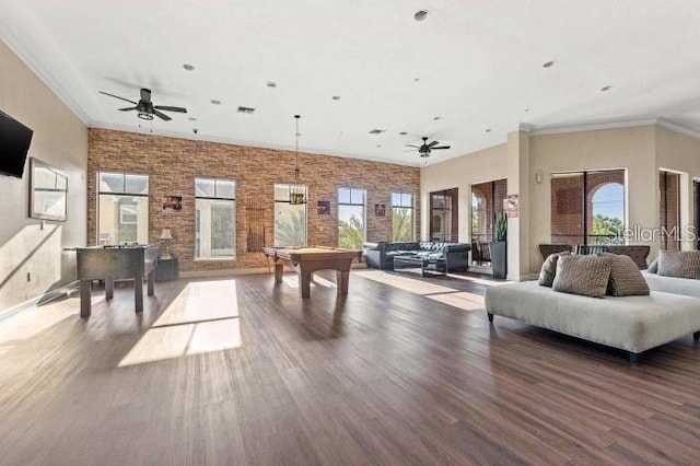 game room with hardwood / wood-style flooring, ceiling fan, and billiards