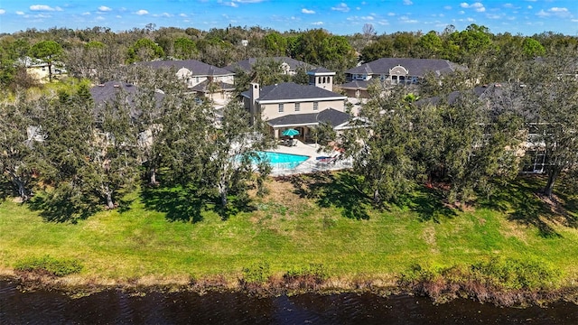 birds eye view of property featuring a water view