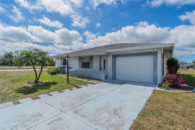 ranch-style house with stucco siding, a shingled roof, concrete driveway, an attached garage, and a front yard