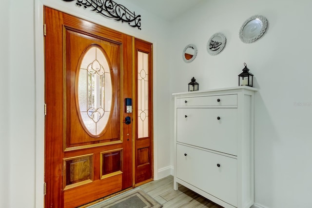 foyer featuring light wood-style flooring