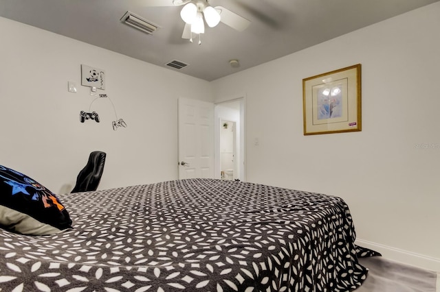 bedroom with ceiling fan, visible vents, and baseboards