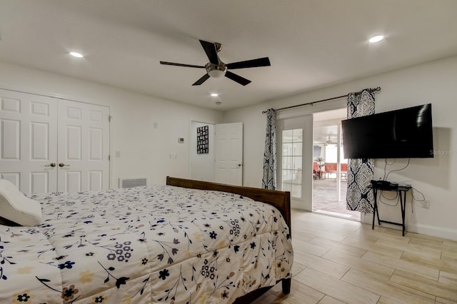 bedroom featuring wood finish floors, recessed lighting, visible vents, ceiling fan, and baseboards