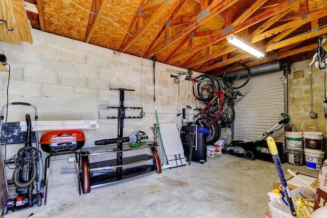 garage featuring concrete block wall