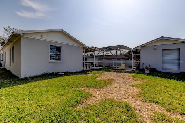 view of yard featuring a lanai