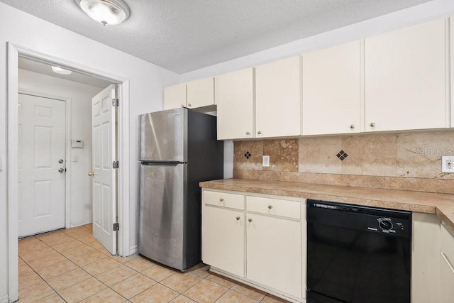 kitchen with decorative backsplash, stainless steel refrigerator, dishwasher, and light tile patterned flooring