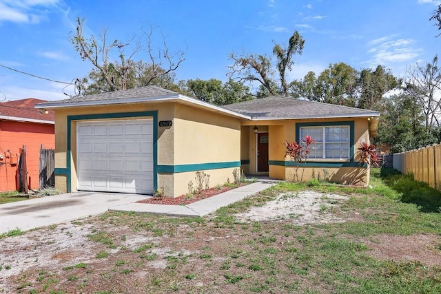 ranch-style house featuring a garage