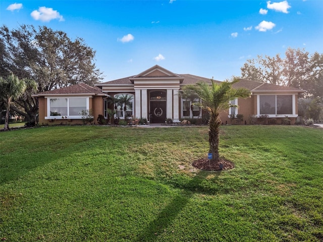 view of front of house with a front yard