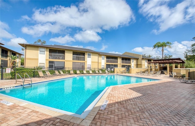 view of swimming pool with a patio