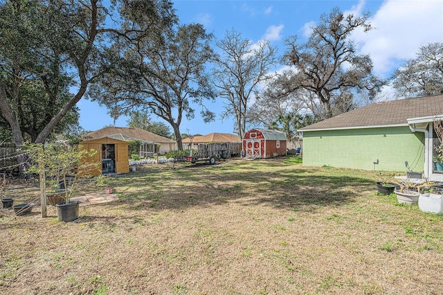 view of yard with a storage unit