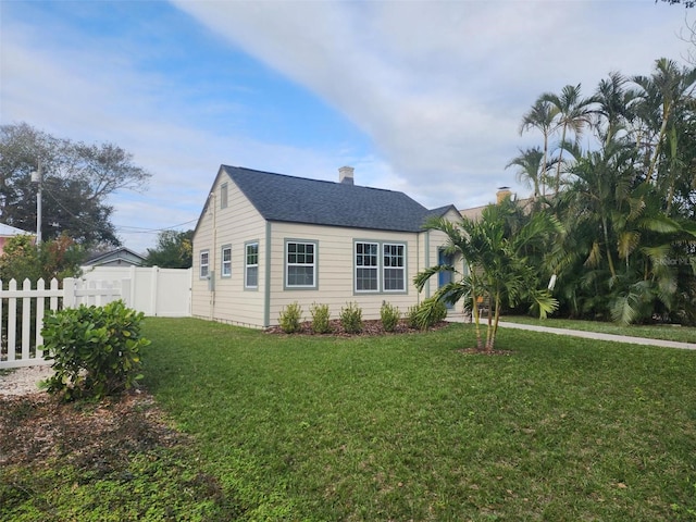 view of front of home with a front yard