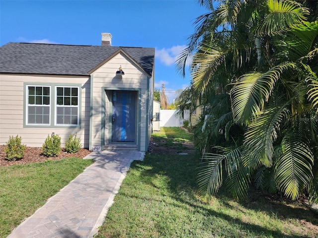 exterior space with a front lawn