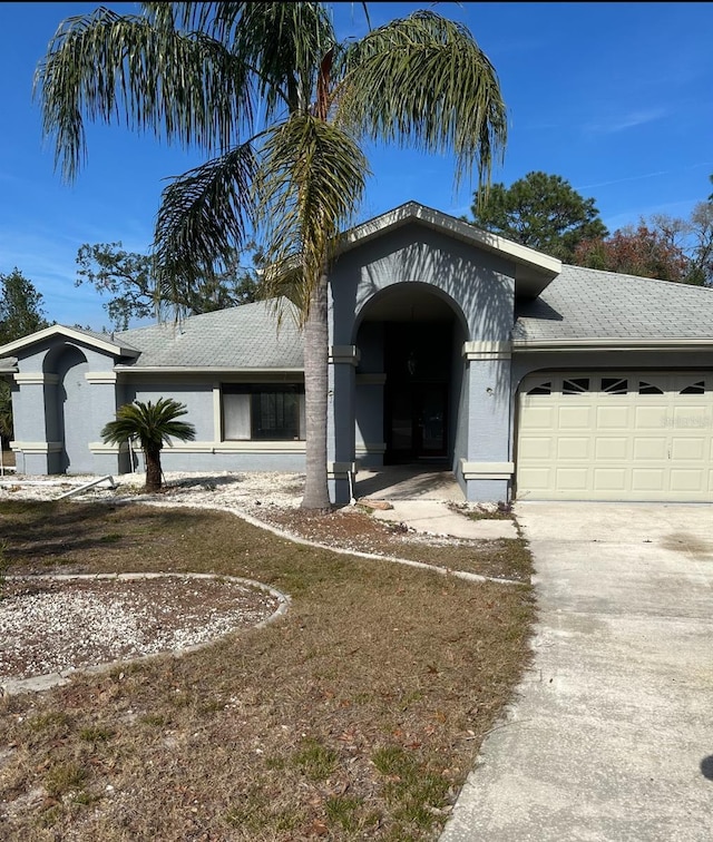 view of front of home featuring a garage