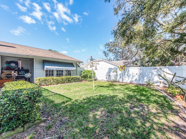 view of yard featuring a fenced backyard