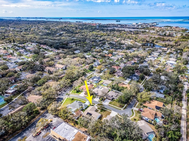 birds eye view of property featuring a residential view and a water view