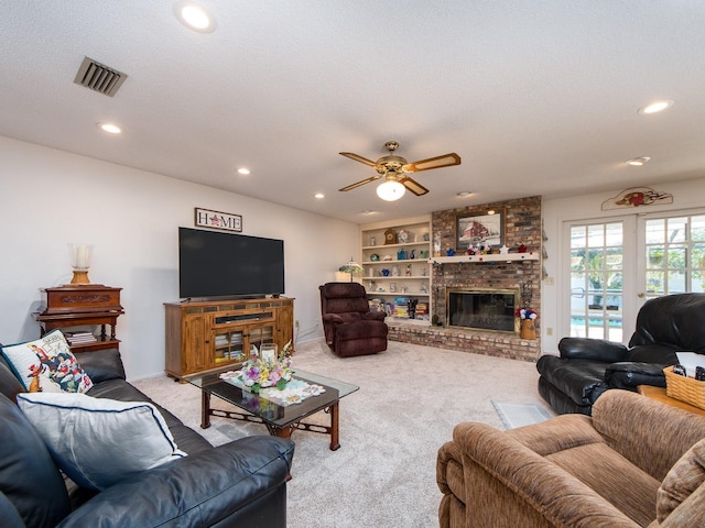 2893 Turtle Ter, Palm Harbor, FL 34683 - carpeted living room with recessed lighting, a brick fireplace, and a ceiling fan