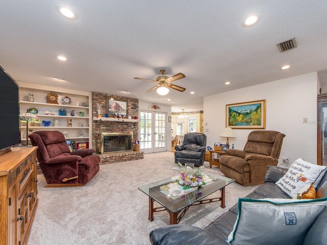 2893 Turtle Ter, Palm Harbor, FL 34683 - living room with carpet flooring, a ceiling fan, recessed lighting, a textured ceiling, and a fireplace