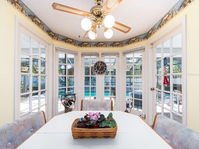 2893 Turtle Ter, Palm Harbor, FL 34683 - dining room with healthy amount of natural light and a ceiling fan