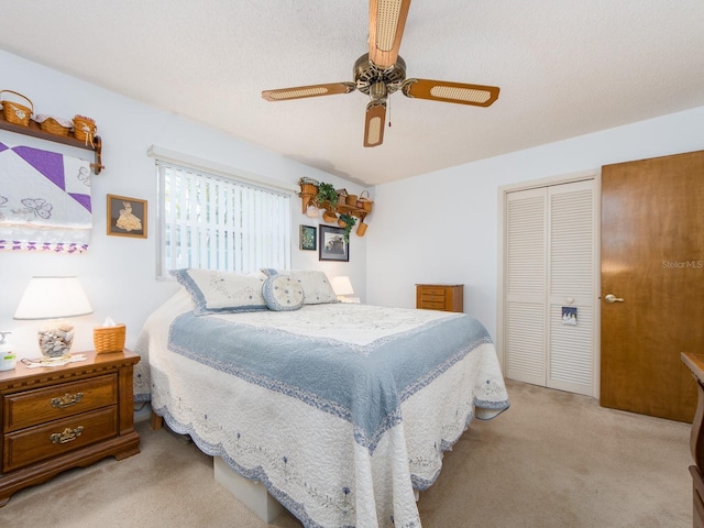 2893 Turtle Ter, Palm Harbor, FL 34683 - carpeted bedroom featuring a closet and a ceiling fan