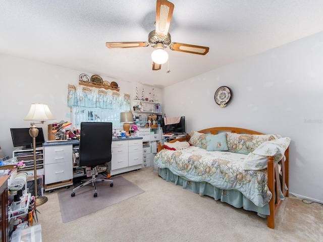 2893 Turtle Ter, Palm Harbor, FL 34683 - bedroom featuring a desk, light colored carpet, and a ceiling fan
