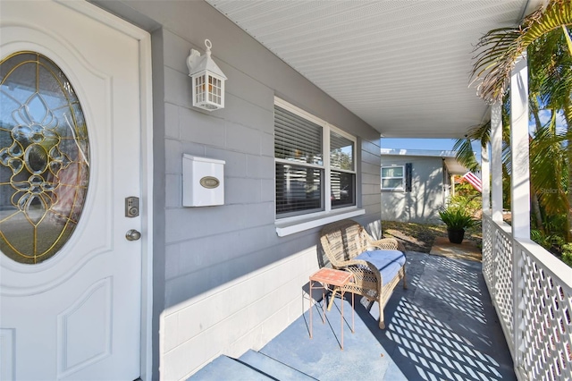 property entrance with a porch