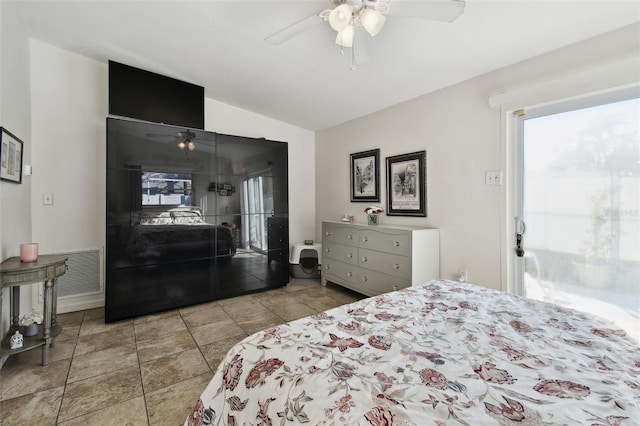 bedroom featuring vaulted ceiling and ceiling fan