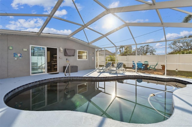 view of pool featuring a lanai and a patio