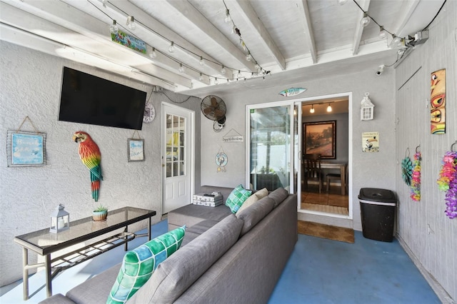 living room featuring concrete flooring