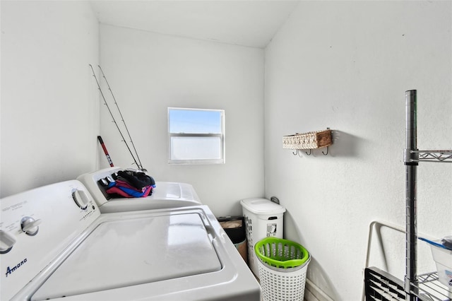 laundry room with independent washer and dryer