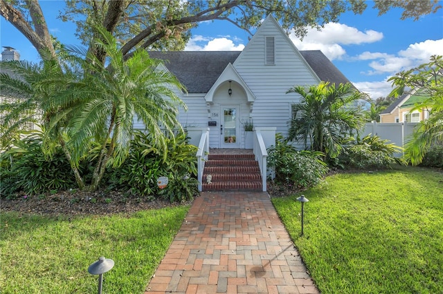 view of front of property with a front lawn