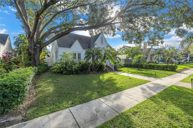 view of front of house with a front lawn