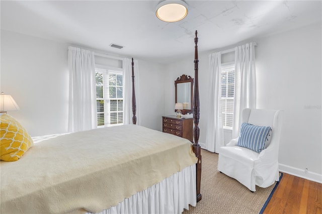 bedroom featuring hardwood / wood-style floors