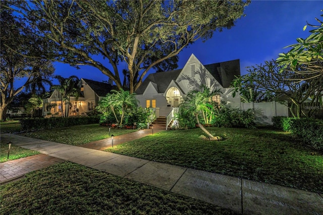 view of front of home featuring a front lawn