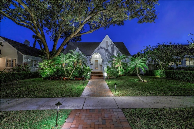 view of front of house with a front lawn