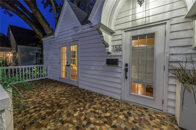 doorway to property featuring french doors