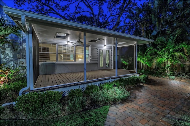 exterior space featuring french doors and ceiling fan