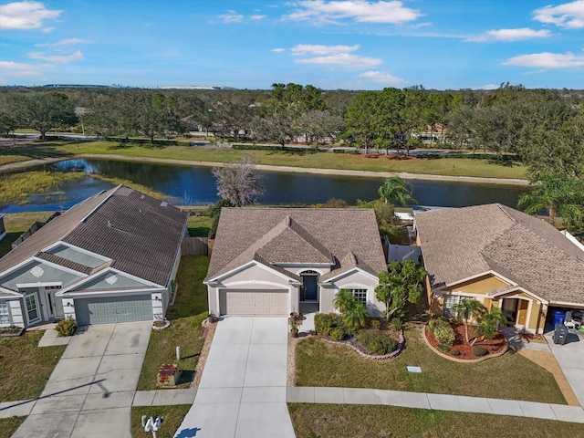 drone / aerial view with a water view