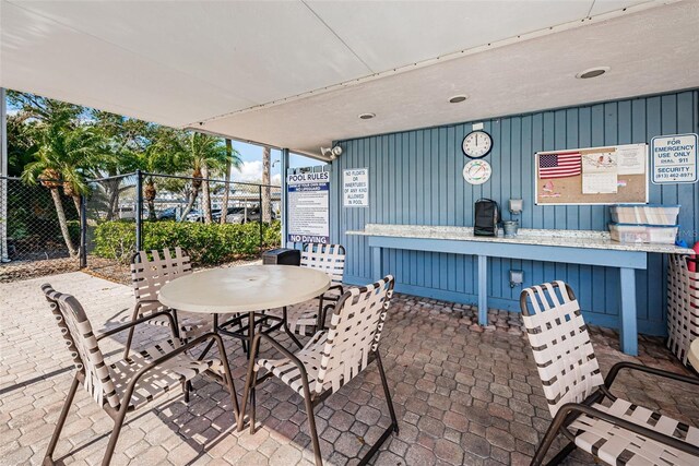 256 Cypress Ln Unit 120, Oldsmar, FL 34677 - view of patio / terrace with outdoor dining area
