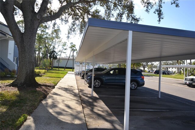 256 Cypress Ln Unit 120, Oldsmar, FL 34677 - view of covered parking lot