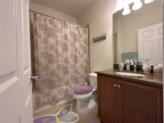 full bathroom featuring tile patterned flooring, vanity, shower / tub combo with curtain, and toilet