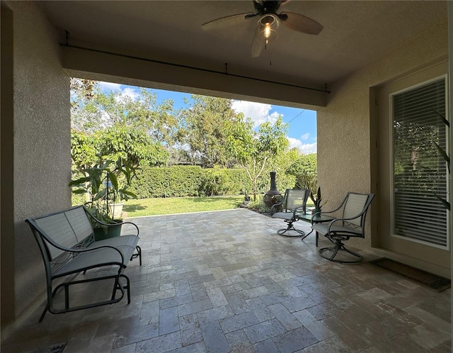 view of patio / terrace featuring ceiling fan