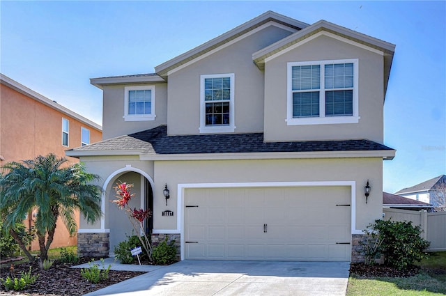 front of property featuring a garage