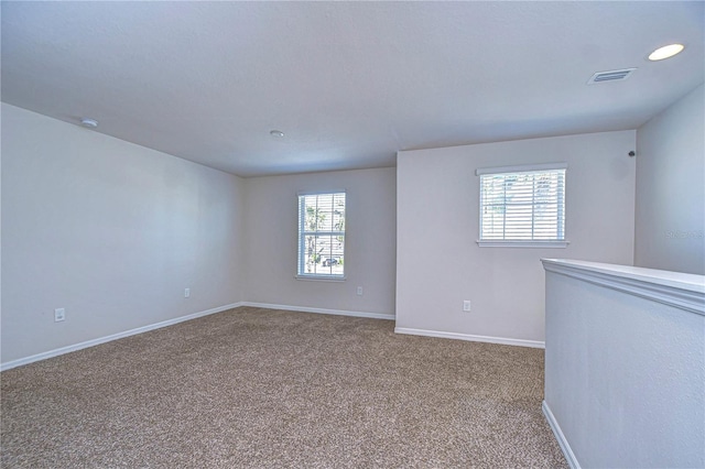 view of carpeted spare room