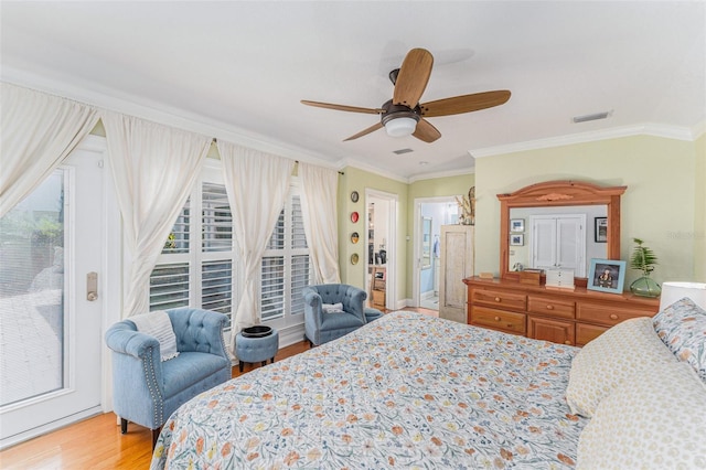 bedroom with crown molding, ceiling fan, access to exterior, and light hardwood / wood-style flooring